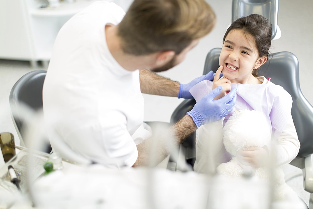 Child smiling during a dental check-up